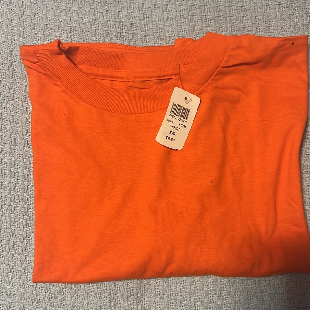 Two brand new Men’s Footlocker T-Shirts Orange and Red size XXL